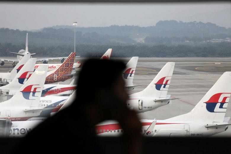 Bandara Kuala Lumpur menggantikan peralatan yang rusak tetapi masih mengalami beberapa penundaan