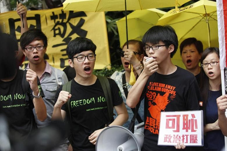 Protes HK: Aktivis Joshua Wong dan Nathan Law didakwa atas demonstrasi anti-China tahun lalu